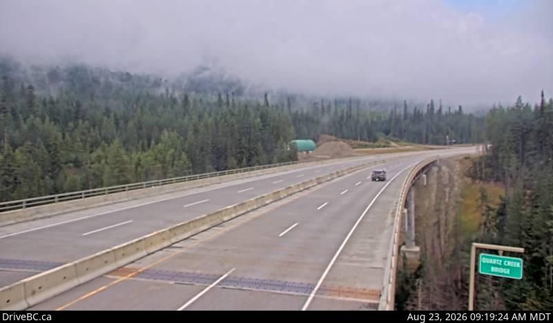 Traffic Cam Columbia-Shuswap Regional District › East: Hwy 1, 40 km west of Golden, near the Quartz Creek bridge, looking east