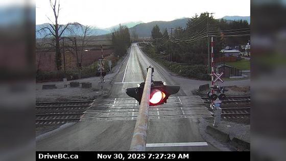 Traffic Cam Chilliwack › West: Hwy 7 at Deroche Rd and Nicomen Rd railway crossing, looking west