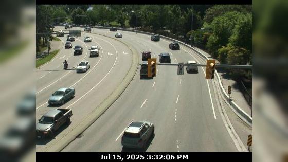 Traffic Cam North Kelowna › West: East approach to WR Bennett Bridge at Abbott Street, looking west along Hwy